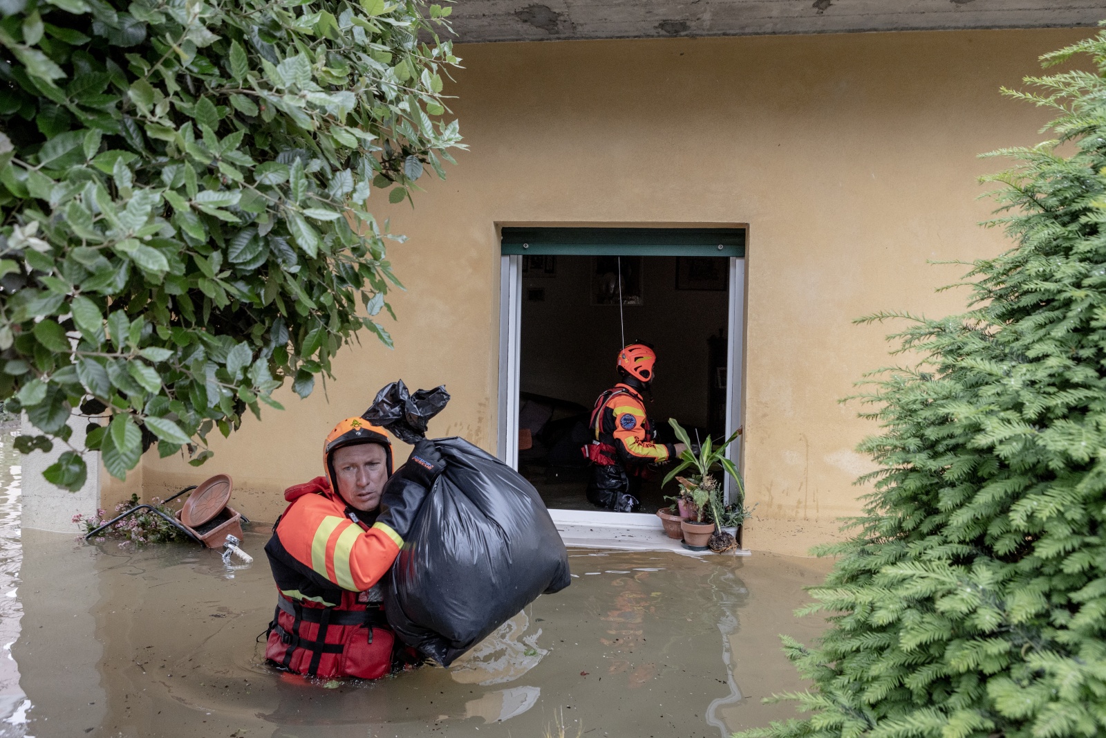 FORNACE ZARATTINI, ITALY  MAY 20:
Firefighters rescue people and recover their belongings in houses submerged in water. The flood and the overflow of rivers, in fact, has invaded entire neighborhoods and in some points exceeds one meter of depth in Fornace Zarattini, Emilia-Romagna, on May 20, 2023.