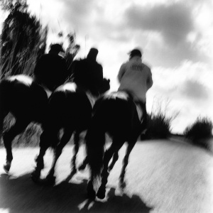 tre uomini a cavallo