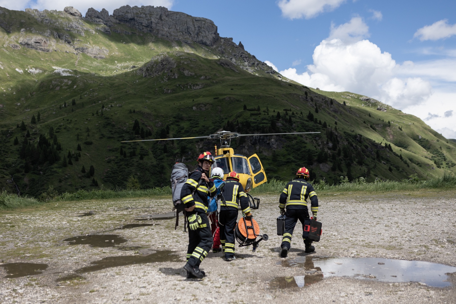 TRENTINO ALTO ADIGE, ITALY - JULY 2022 - Canazei firefighters transport the geo radars that will be used on the Marmolada glacier cap to check its micro-movements in Trentino Alto Adige, on July 5, 2022.
