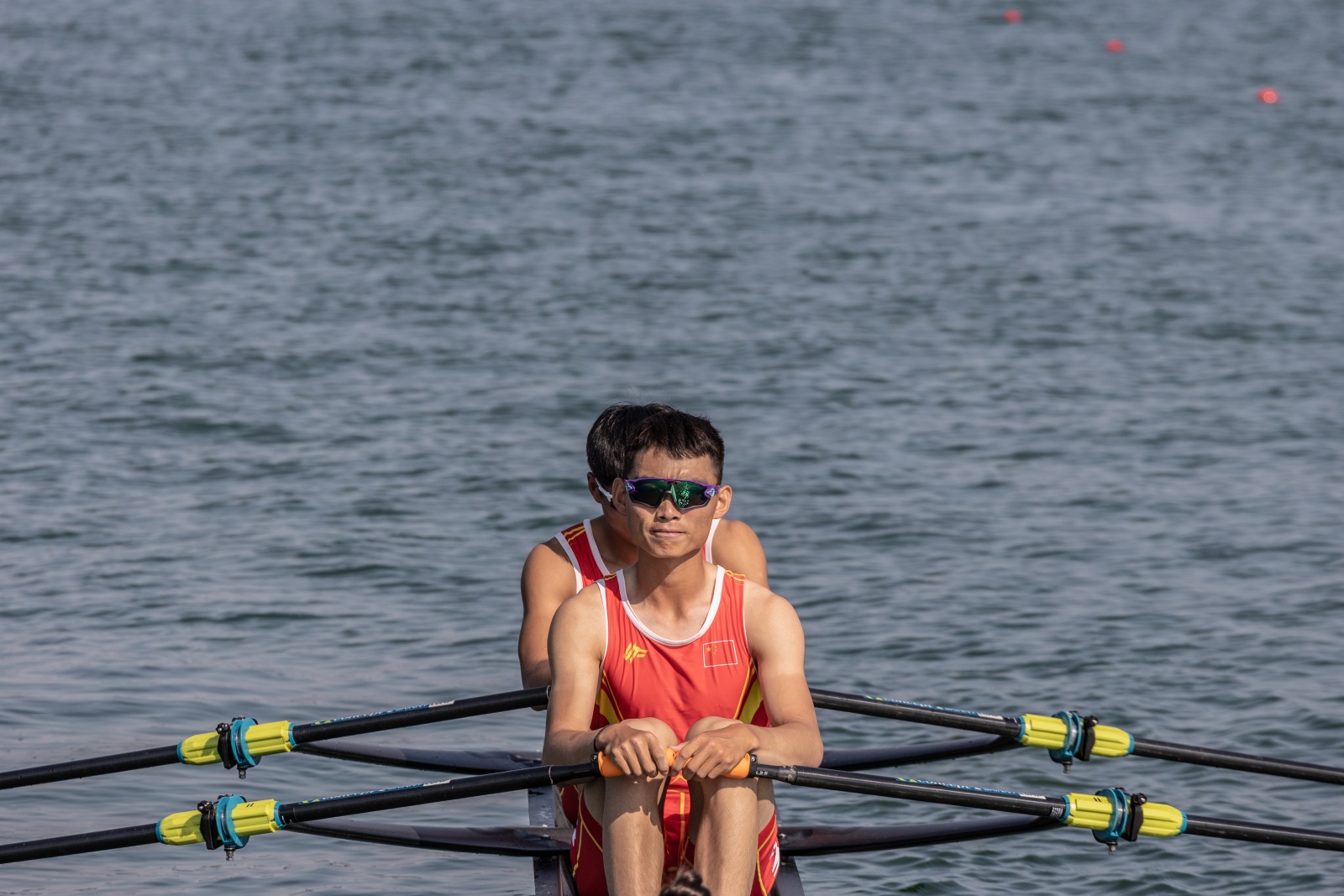 VARESE, ITALY - JUNE 16: Athletes of Chinese National Rowing team waits for the starting siren to sound at the race at the World Rowing Cup II in Varese, Italy, on June 16, 2023.