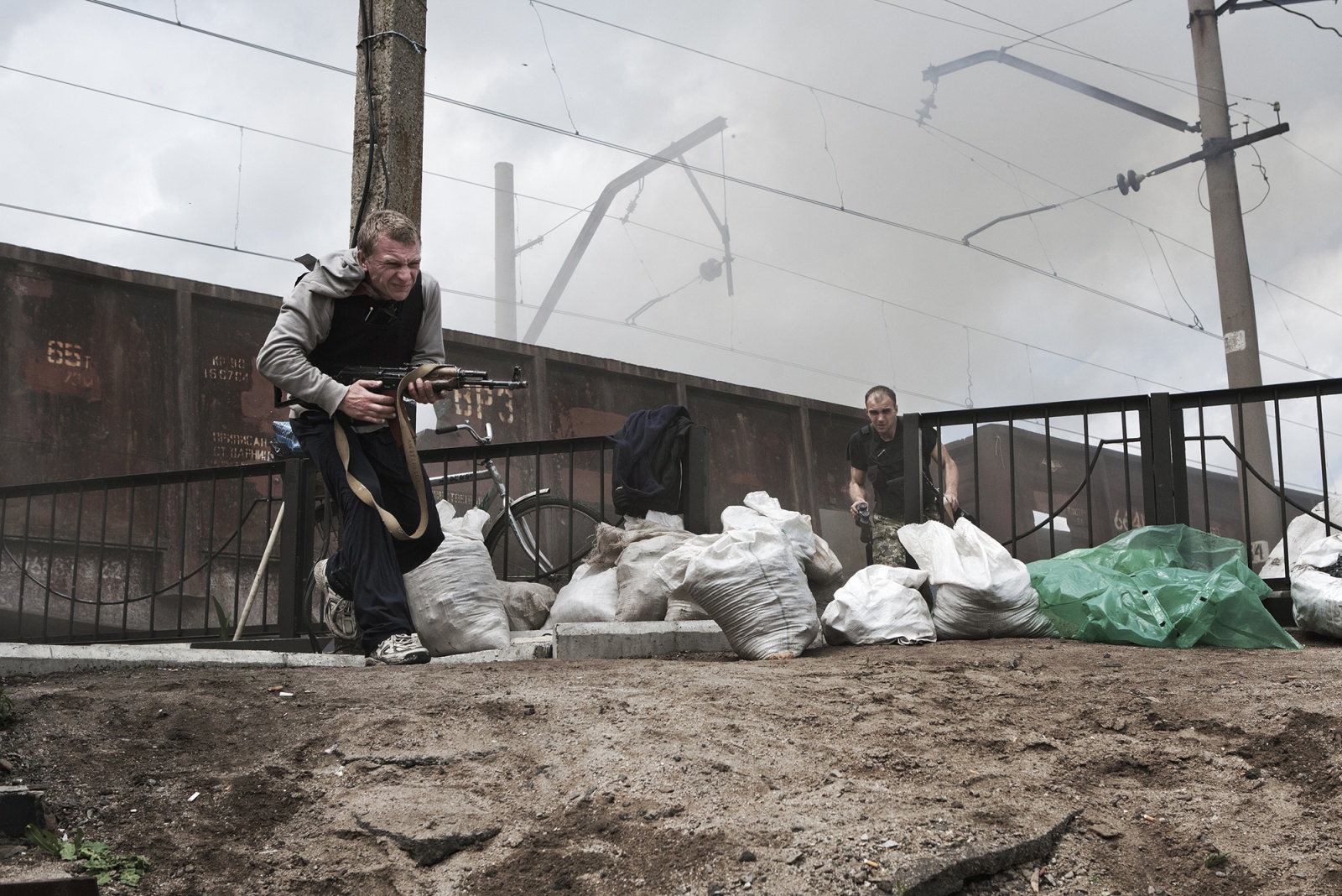 Slavyansk, Andriivka village, Ukraine. May 2014 - A bomb fired by the regular Ukrainian hits a train used by pro-Russian militants as barricade, near a small village just outside Sloviansk.The checkpoint, now recaptured and under the control of the Ukrainian troops, is located near to Karachun Mount, stronghold of the regular army.